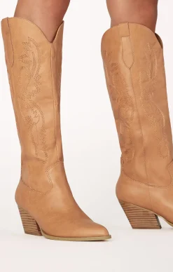 Show Me Your Mumu Billini Zeina Cowboy Boot Billini Zeina Cowboy Boot $120 Complete the Look Add to wishlist Lack of Color Raffia Cowboy Hat Natural $80 Add to wishlist Outlaw Dress Pearly White $164 Add to wishlist Agnes Woven Bag Beige $56 Add to wishlist Jackie Mack Jess Earrings Gold $38 Billini Zeina Cowboy Boot $120 6 7 8 9 10 Size 6 7 8 9 10 Color Camel Size Size Guide 6 7 8 9 10 Runs Small True to Size Runs Large .product-callout__text--promo { } Add To Cart