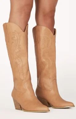 Show Me Your Mumu Billini Zeina Cowboy Boot Billini Zeina Cowboy Boot $120 Complete the Look Add to wishlist Lack of Color Raffia Cowboy Hat Natural $80 Add to wishlist Outlaw Dress Pearly White $164 Add to wishlist Agnes Woven Bag Beige $56 Add to wishlist Jackie Mack Jess Earrings Gold $38 Billini Zeina Cowboy Boot $120 6 7 8 9 10 Size 6 7 8 9 10 Color Camel Size Size Guide 6 7 8 9 10 Runs Small True to Size Runs Large .product-callout__text--promo { } Add To Cart