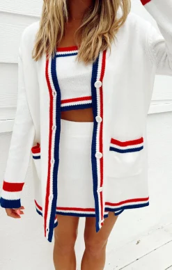 Kids Show Me Your Mumu Lambert Cardigan                Sign in or create an account to add to your Wishlist              Select a size to add to your Wishlist    #wishlist-modal {width: 297px;background-color: #FFFFFF;box-shadow: 0 1px 4px 0 rgba(0,0,0,0.2);  position: absolute;  right:0;  top:0;  opacity:0;  transition: .3s opacity ease-in-out;  z-index: -1;}#wishlist-modal .icon-close {  position: absolute;  top: 15px;  right: 15px;  opacity: .2;  cursor:pointer;}#wishlist-modal.active {  opacity:1;  z-index:9999;}.wishlist-signin {  font-family: 'Centra No 1 Light';  font-size:14px;  font-weight:bold;  padding:20px;  width:90%;}.wishlist-signin div {  margin-top:10px;}.wishlist-signin a {  display:inline-block;  border-bottom:4px solid #fbccc2;}.divider {      background:#edede8;      margin: 10px 0 10px 0;      height: 2px;  }.showroom-bridesmaids {  margin-left:0;  margin-top:20px;}.wm-content {  padding:20px;}.callout-item {  padding:20px;  background: #f1f1ed;  margin-bottom:5px;}.in-wishlist .product-wishlist {  opacity:1;}.in-wishlist .product-wishlist__icon--active {    display:block;  }.in-wishlist  .product-wishlist__icon--default {  display:none !important;}.in-wishlist  .product-wishlist__icon--hover {  display:none !important;} .columns {    display: flex;    margin:0 !important;    justify-content: space-between;}.columns.x2 .column {  width:48%;}.wishlist-actions {  padding:5px;  font-size:13px;}#wishlist-modal svg {    display: inline;    margin-bottom: -6px;}@media only screen and (max-width: 767px) {  #wishlist-modal {    position: absolute;    top: 0 !important;    left: 0 !important;    width: 100%;  }}                      Your Online Showroom                                                            Showroom Selects                             0