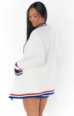 Show Me Your Mumu Lambert Cardigan                Sign in or create an account to add to your Wishlist              Select a size to add to your Wishlist    #wishlist-modal {width: 297px;background-color: #FFFFFF;box-shadow: 0 1px 4px 0 rgba(0,0,0,0.2);  position: absolute;  right:0;  top:0;  opacity:0;  transition: .3s opacity ease-in-out;  z-index: -1;}#wishlist-modal .icon-close {  position: absolute;  top: 15px;  right: 15px;  opacity: .2;  cursor:pointer;}#wishlist-modal.active {  opacity:1;  z-index:9999;}.wishlist-signin {  font-family: 'Centra No 1 Light';  font-size:14px;  font-weight:bold;  padding:20px;  width:90%;}.wishlist-signin div {  margin-top:10px;}.wishlist-signin a {  display:inline-block;  border-bottom:4px solid #fbccc2;}.divider {      background:#edede8;      margin: 10px 0 10px 0;      height: 2px;  }.showroom-bridesmaids {  margin-left:0;  margin-top:20px;}.wm-content {  padding:20px;}.callout-item {  padding:20px;  background: #f1f1ed;  margin-bottom:5px;}.in-wishlist .product-wishlist {  opacity:1;}.in-wishlist .product-wishlist__icon--active {    display:block;  }.in-wishlist  .product-wishlist__icon--default {  display:none !important;}.in-wishlist  .product-wishlist__icon--hover {  display:none !important;} .columns {    display: flex;    margin:0 !important;    justify-content: space-between;}.columns.x2 .column {  width:48%;}.wishlist-actions {  padding:5px;  font-size:13px;}#wishlist-modal svg {    display: inline;    margin-bottom: -6px;}@media only screen and (max-width: 767px) {  #wishlist-modal {    position: absolute;    top: 0 !important;    left: 0 !important;    width: 100%;  }}                      Your Online Showroom                                                            Showroom Selects                             0